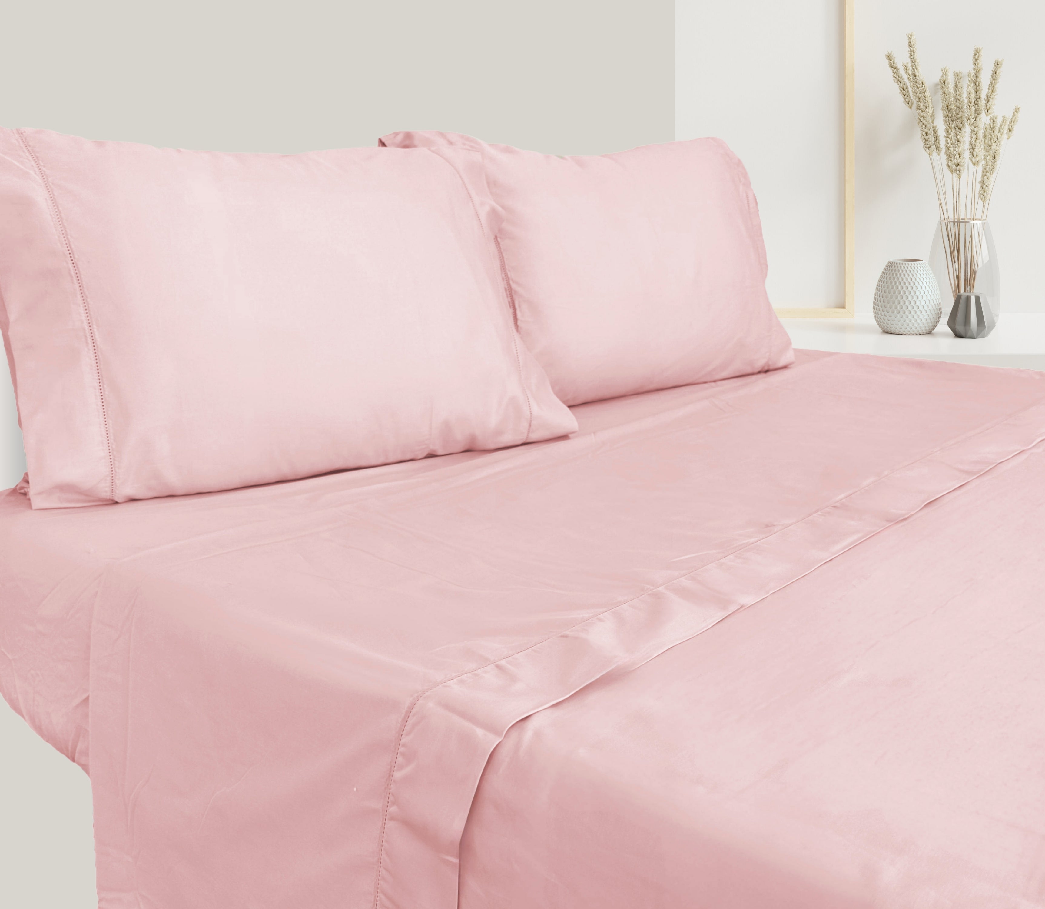 Parure de draps en satin rose